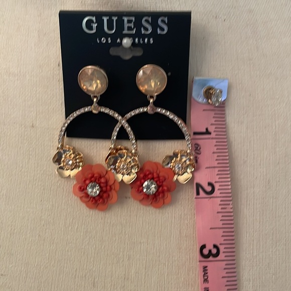 🌻NWT Guess fashion gold tone and crystal floral circle earrings. Fun!!​ - Picture 3 of 5